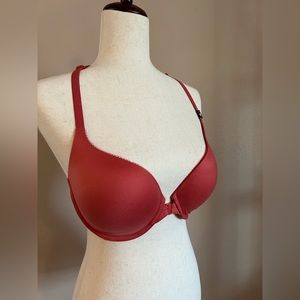 Victoria’s Secret bra, size 34DD, orange/terra cotta color